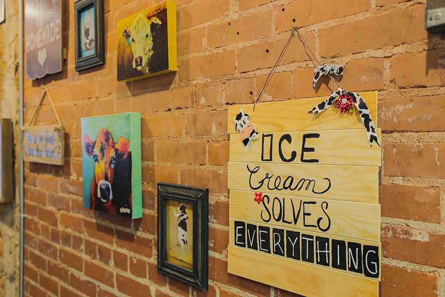 The sign says it all.  Ice cream solves everything! Come to main street in Greenville and find out!
